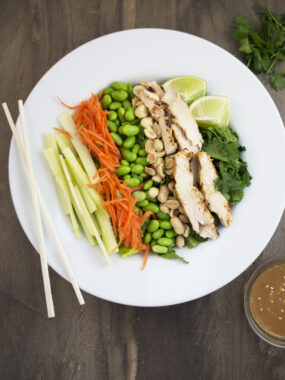 an overhead look at this Thai chicken salad in a white serving bowl | chefsavvy.com