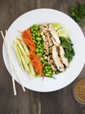 an overhead look at this Thai chicken salad in a white serving bowl | chefsavvy.com