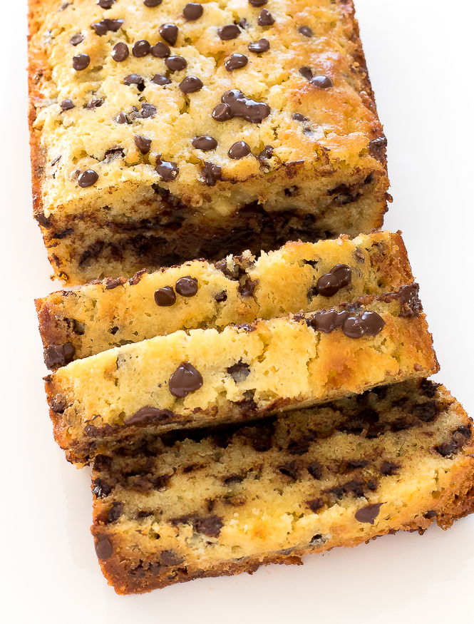 Chocolate chip pound cake slice on a white board.