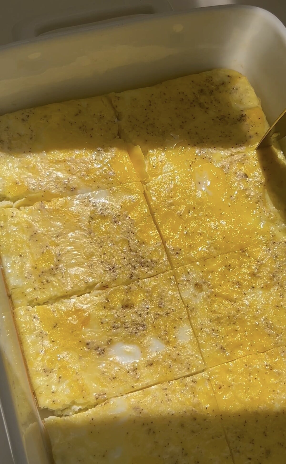 cutting baked eggs into rectangles