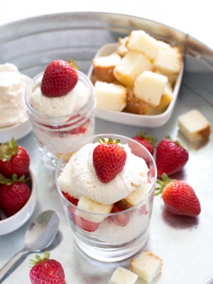 Top shot of strawberry and pound cake desserts on serving tray.