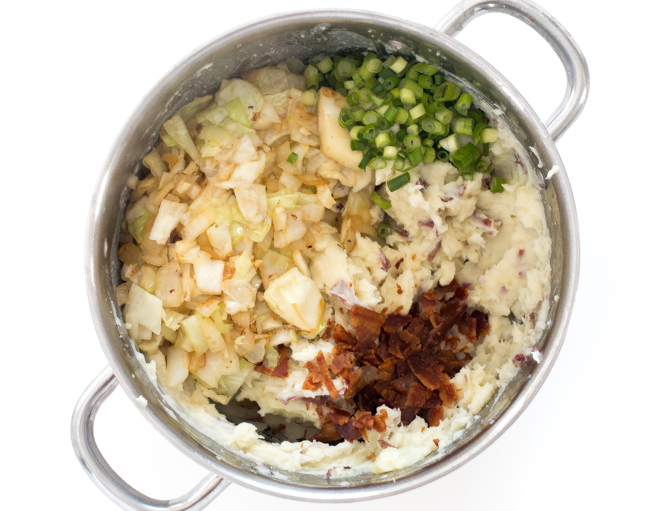 adding cabbage, bacon and green onions to large pot