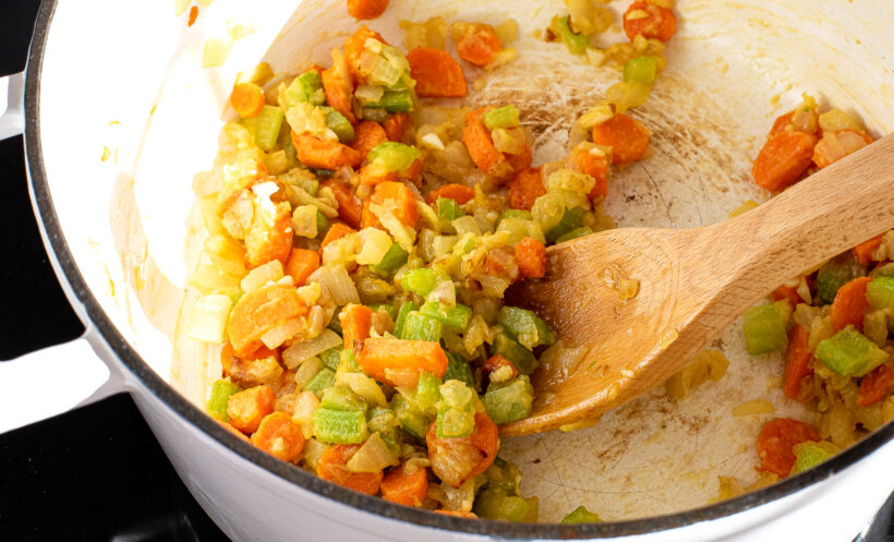 Flour cooking with the veggies in a soup pot. 