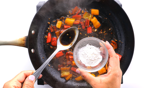 spooning sauce into cornstarch