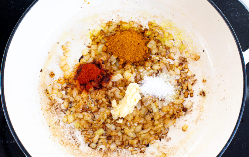 Sauted onions and spices in a large skillet.