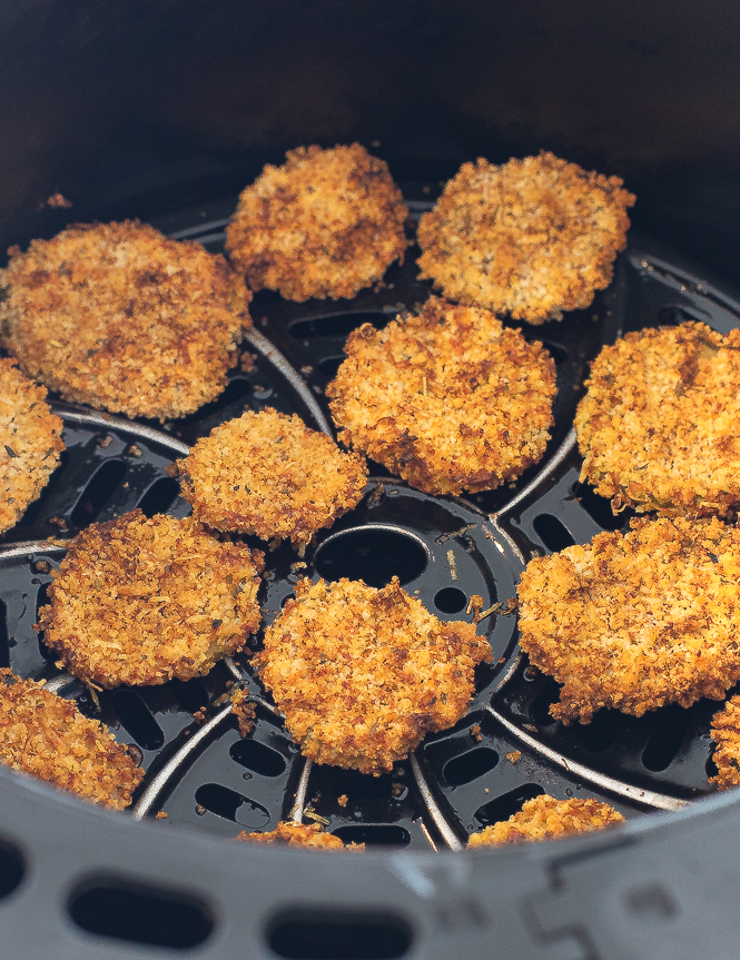 Fried pickles in the insert of an air fryer.