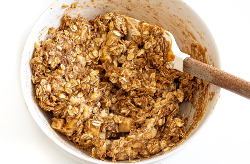 Apple cinnamon oatmeal cookie dough in a mixing bowl.