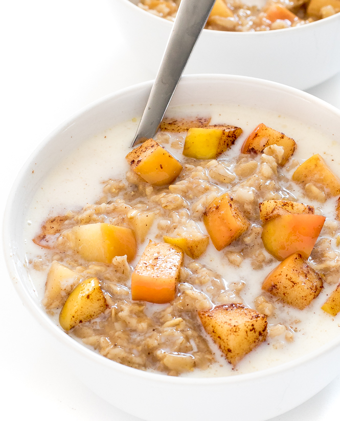 Apple Cinnamon Oatmeal Apple Cinnamon Oatmeal in white bowl topped with milk