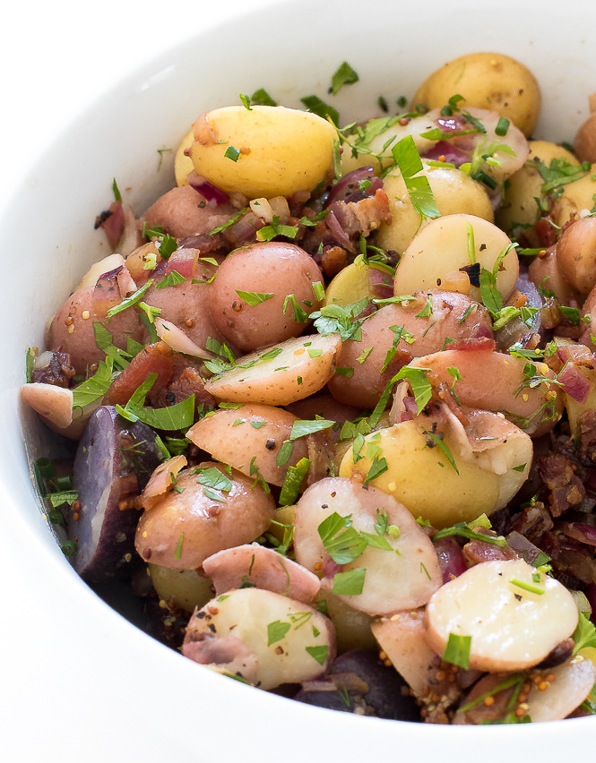 Authentic German Potato Salad in large white bowl