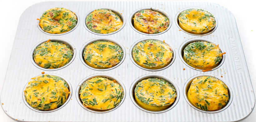 Egg muffins in the muffin tin after being baked. 
