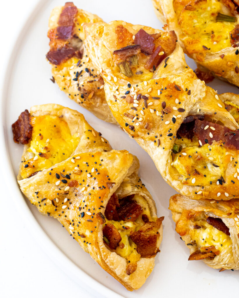Bacon, Egg and Cheese Pastries on a white plate.