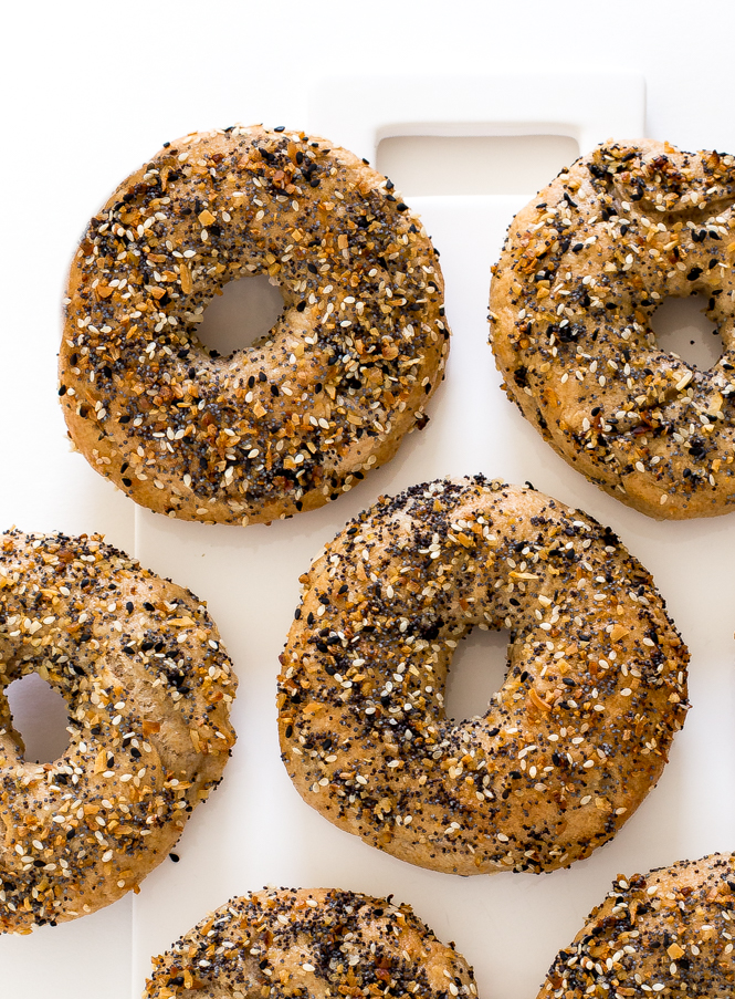 Easy Homemade Everything Bagels | chefsavvy.com Homemade Everything Bagels on a white board.