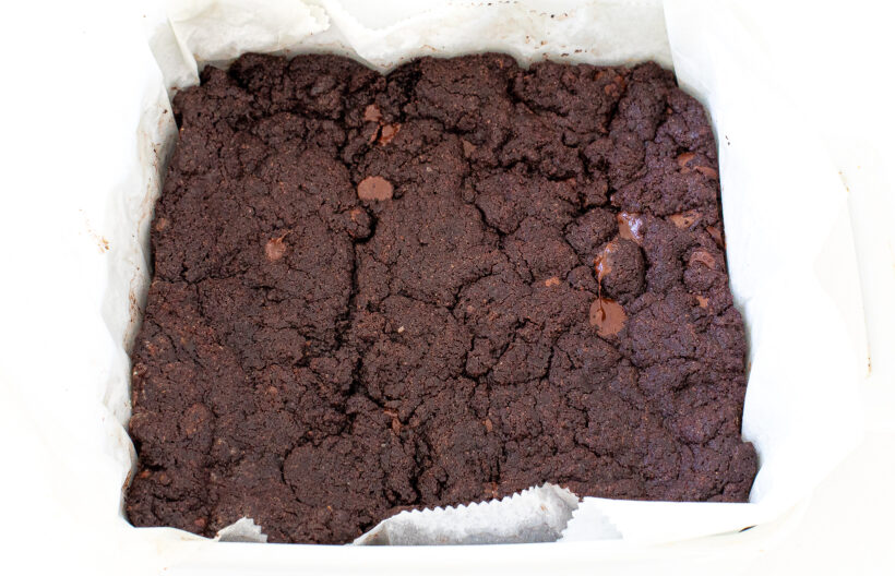 baked brownies in white casserole dish