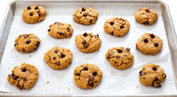 gluten free peanut butter cookies on baking sheet lined with parchment paper