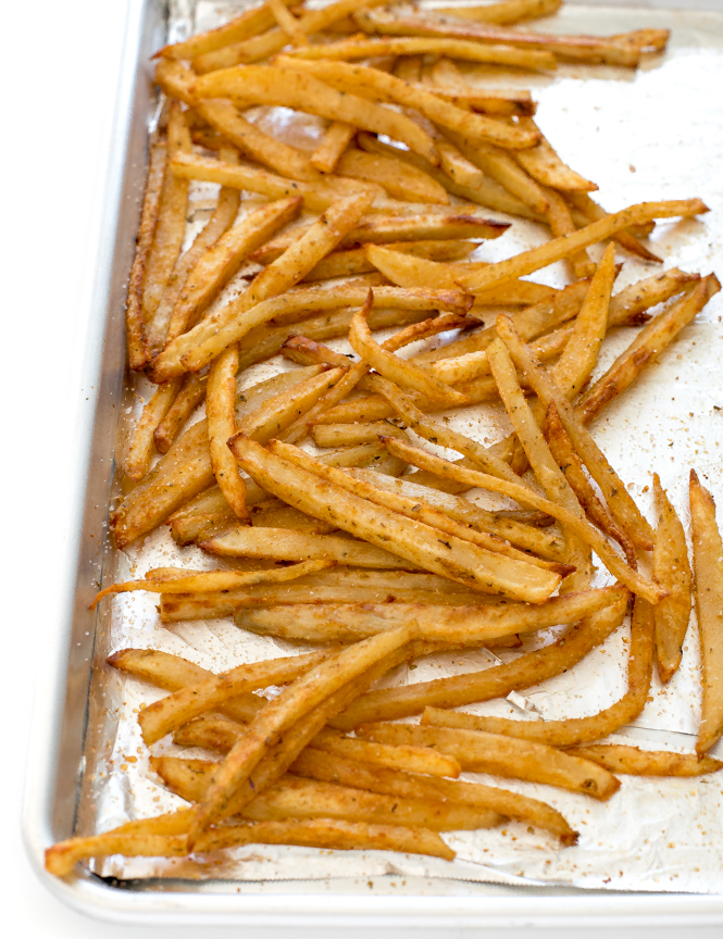 Crispy French Fries on baking sheet lined with foil