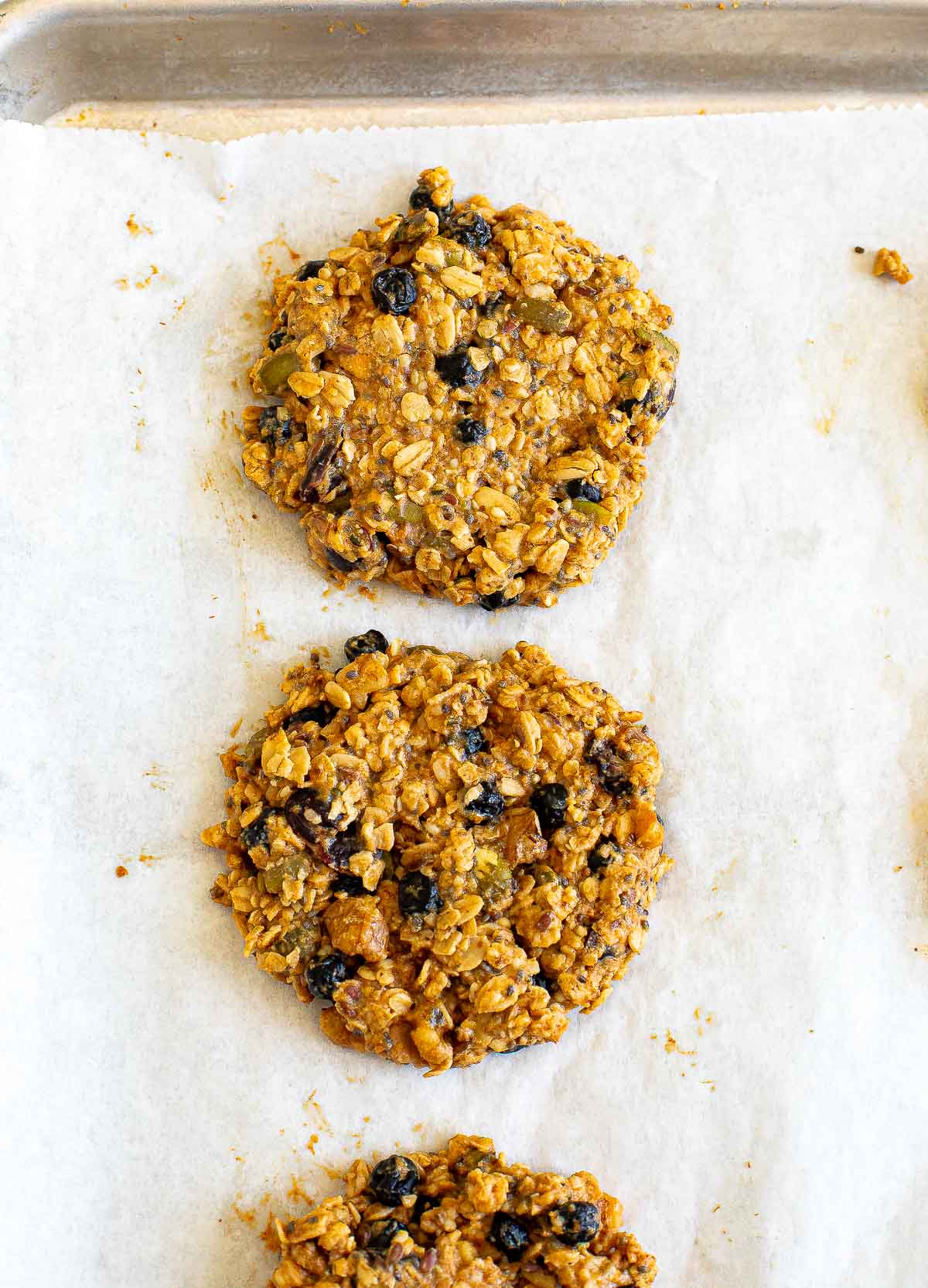 baked granola cookies on baking sheet