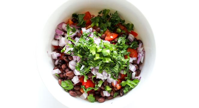 salsa ingredients in large white bowl