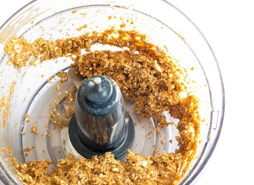 Ingredients for birthday cake energy bites in a food processor. 