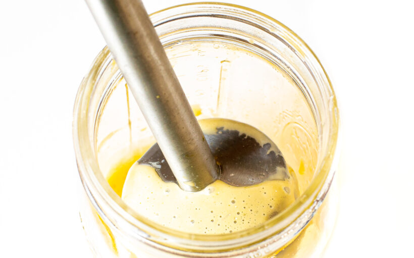 Mayo in a jar with an immersion blender.