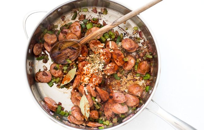 adding spices to pan