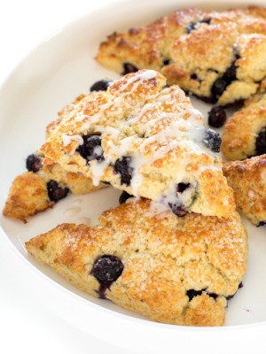 blueberry scones on whtie plate