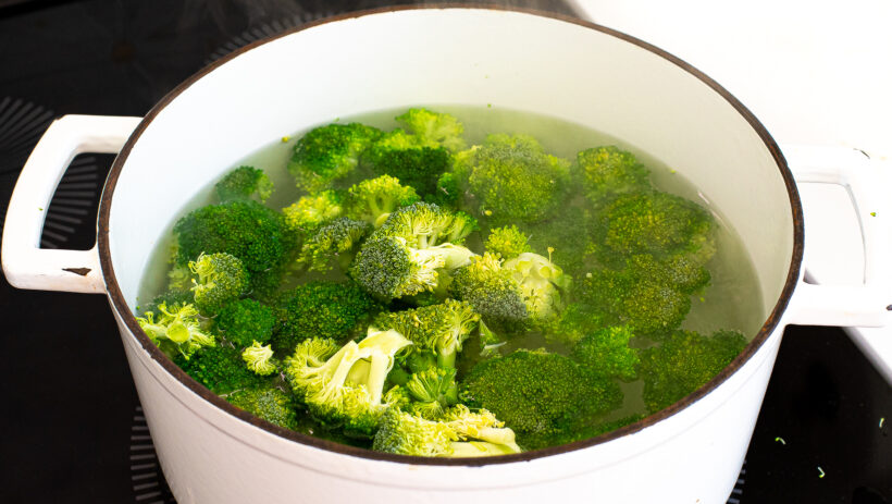 Broccoli boiling in a pot. 