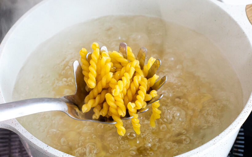 Boiling pasta in a large stock pot. 