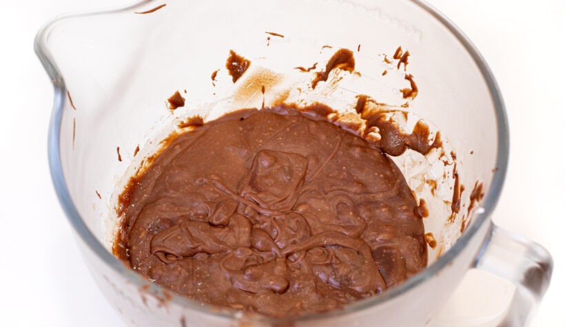 refrigerated brownie cookie dough in clear mixing bowl 
