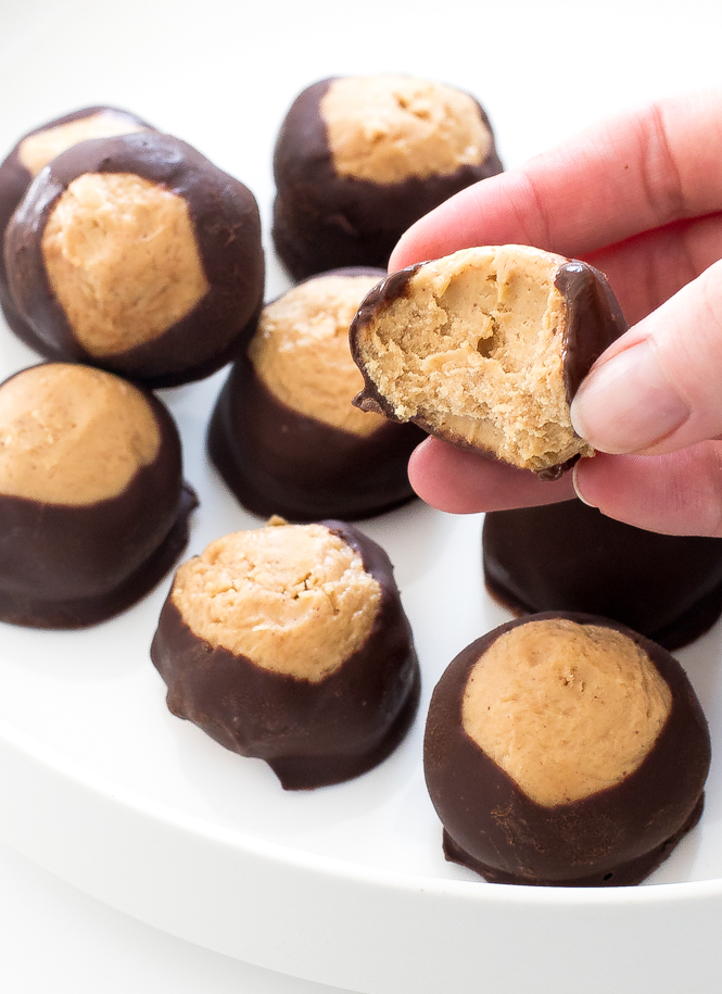 author holding a Buckeye candies in hand