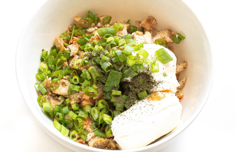 Buffalo chicken mixture in a mixing bowl.