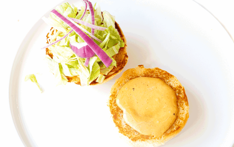 gif of author building burger on homemade burger buns