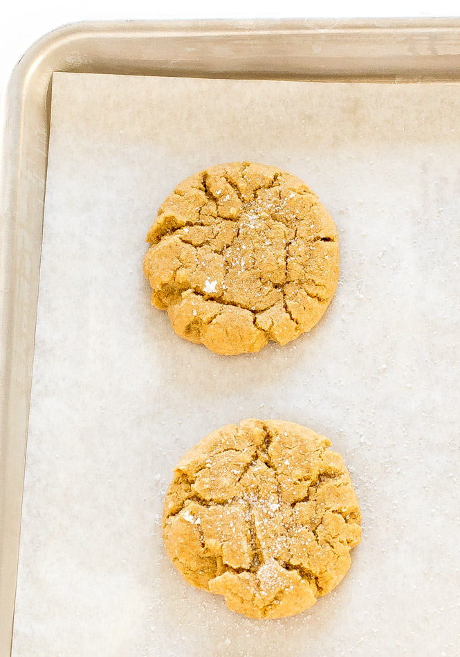 peanut butter cookies on baking sheet lined with parchment paper
