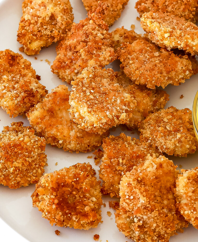 crunchy homemade chicken nuggets on plate