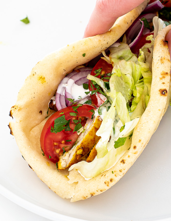 https://chefsavvy.com/wp-content/uploads/chicken-shawarma-pita-on-white-plate.jpg