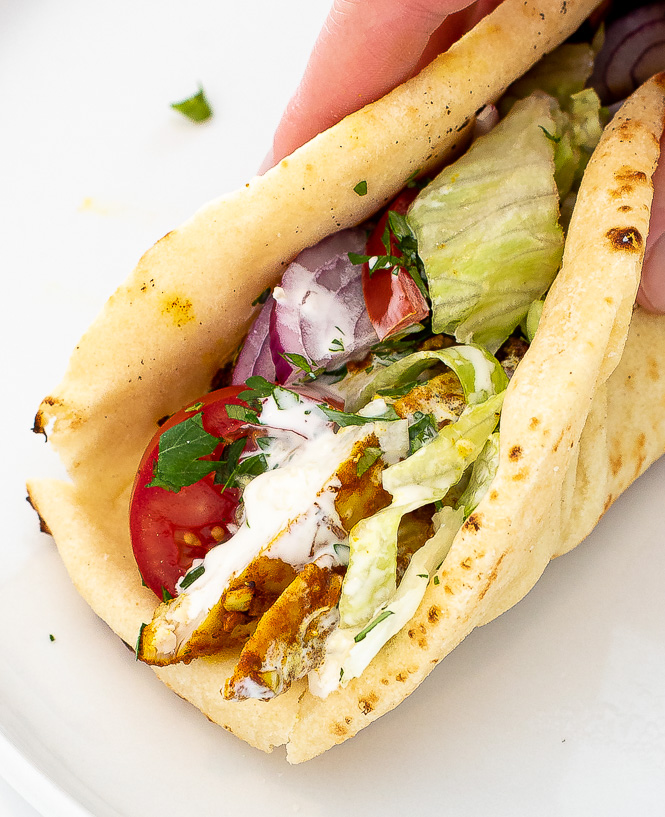 chicken shawarma gyro with tomato, lettuce, onions and parsley