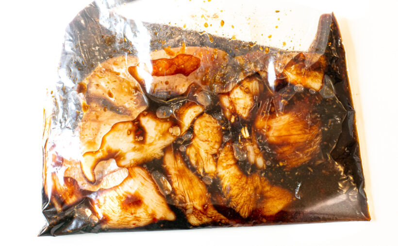 chicken thighs in ziplock bag tossed in asian marinade