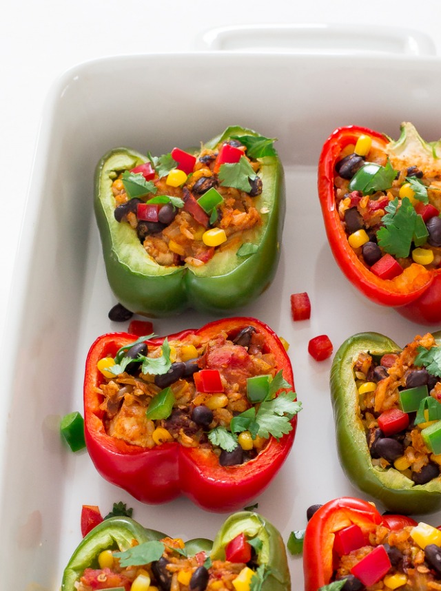 Chipotle chicken stuffed peppers in a baking dish. 
