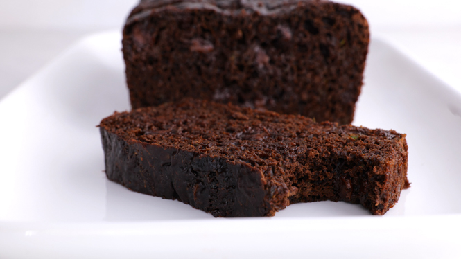 sliced chocolate zucchini bread on plate