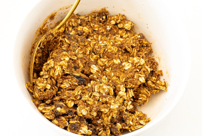Oatmeal raisin energy bite batter in a bowl. 