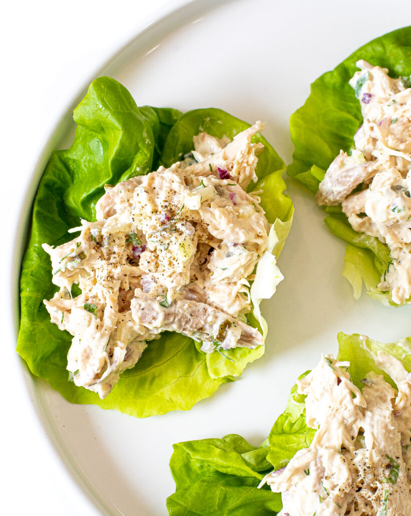 Lettuce cups filled with chicken salad.