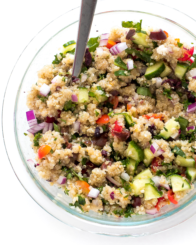 Mediterranean Quinoa Salad | chefsavvy.com Mediterranean Quinoa Salad mixed up in a glass bowl.
