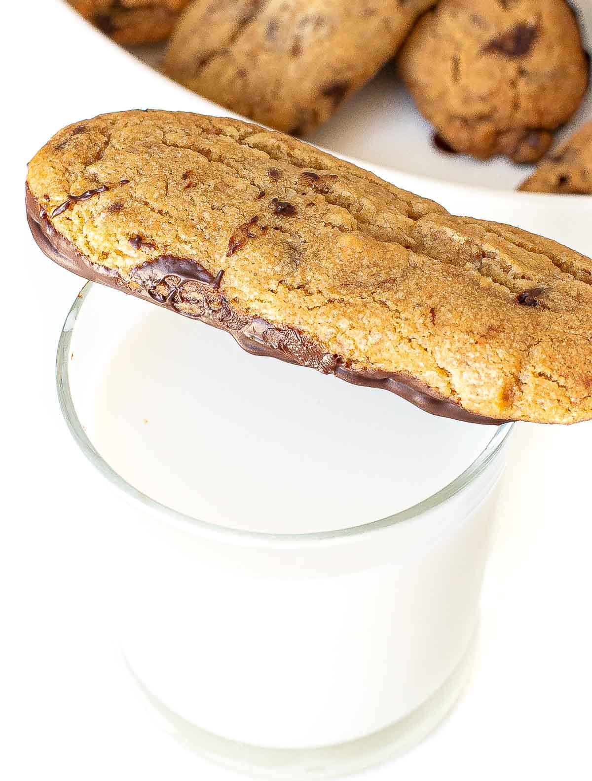 chocolate dunkers on top of a glass of milk