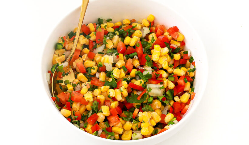 Corn salsa in a white bowl. 