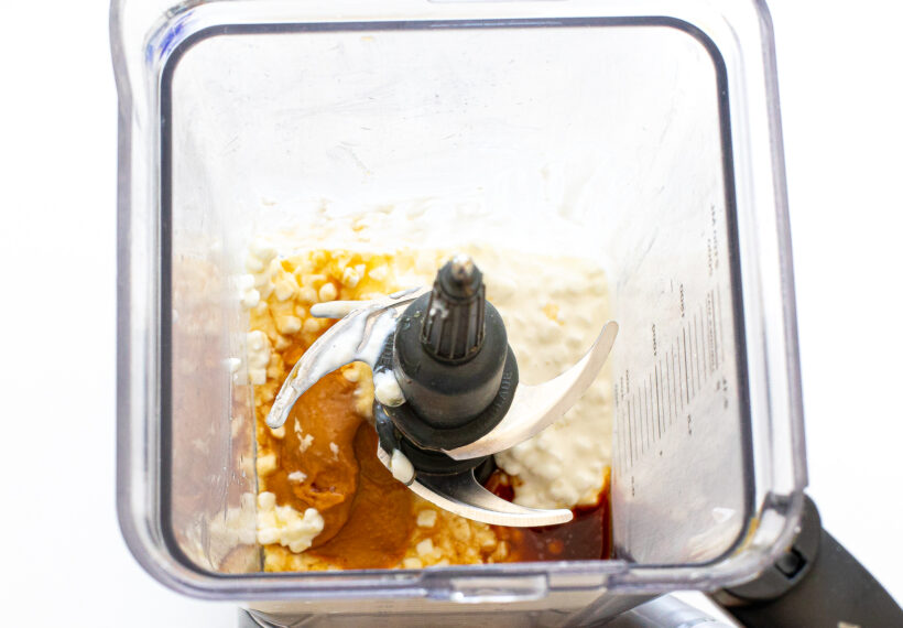 Ingredients for cottage cheese bark in a blender before being blended.