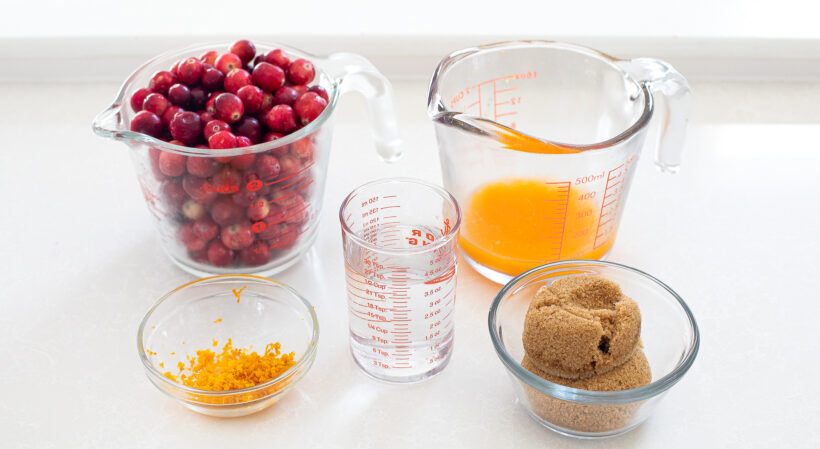 cranberry orange sauce ingredients on counter