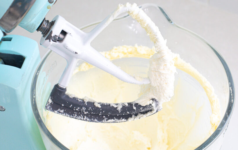 Butter and sugar in a stand mixer bowl with the paddle attachment. 