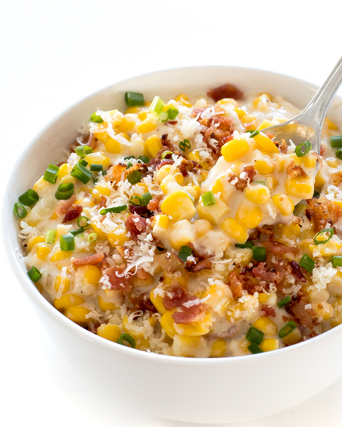 creamed corn topped with bacon, parmesan cheese and chives