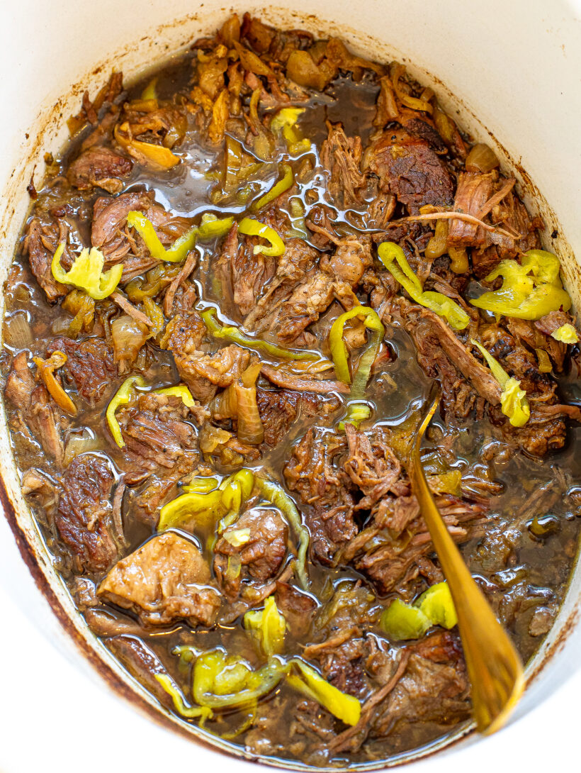 Shredded italian beef in a slow cooker.