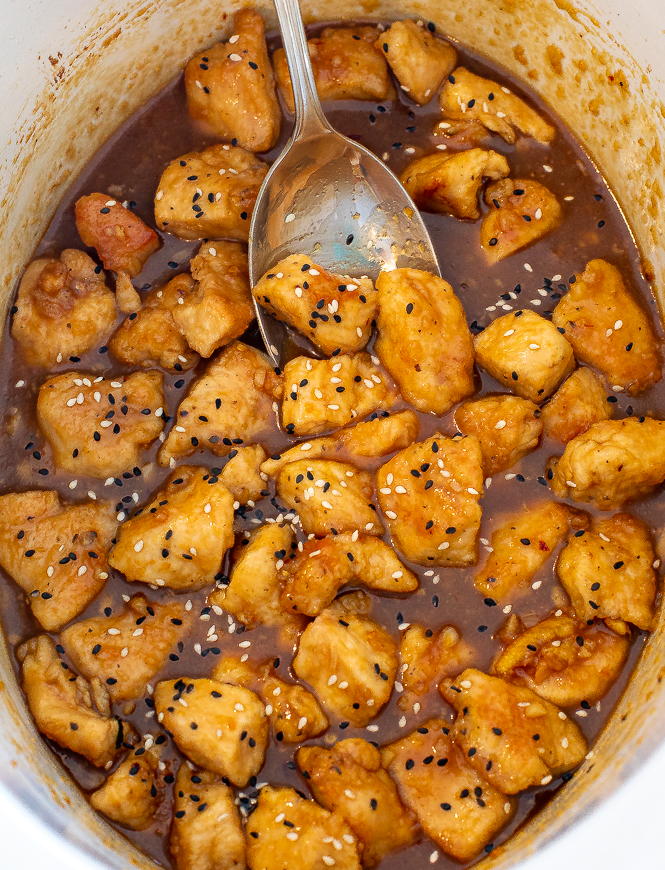 overhead shot of slow cooker orange chicken in crockpot