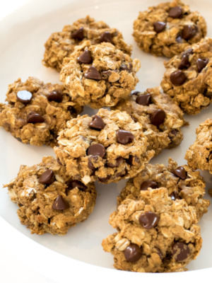 several breakfast cookies with chocolate chips on a white plate | chefsavvy.com